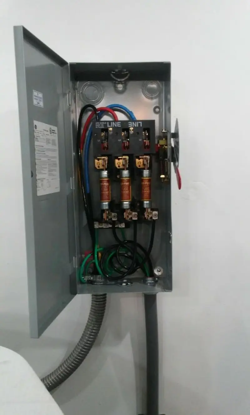 Three-phase disconnect switch installed for Smoke Detector Installation in Rifle